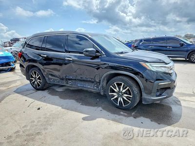 Czwarte zdjęcie samochodu z boku: 2019 HONDA PILOT ELITE VIN:5FNYF6H02KB059290 - miniatura