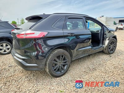 Trzecie zdjęcie samochodu z tyłu: 2022 FORD EDGE SEL VIN:2FMPK4J9XNBA58504 - miniatura