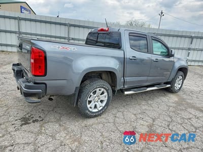 Trzecie zdjęcie samochodu z tyłu: 2021 CHEVROLET COLORADO LT VIN:1GCGTCEN6M1279336 - miniatura