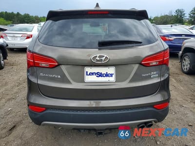 Zdjęcie 6 z 13 samochodu: 2014 HYUNDAI SANTA FE SPORT 2.0T VIN:5XYZWDLA4EG221751 - miniatura