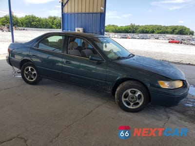 Czwarte zdjęcie samochodu z boku: 1997 TOYOTA CAMRY LE VIN:4T1BG22KXVU044663 - miniatura
