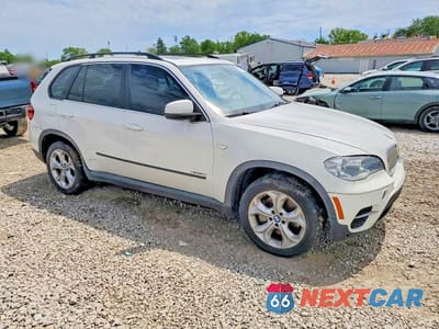 Czwarte zdjęcie samochodu z boku: 2013 BMW X5 XDRIVE50I VIN:5UXZV8C59D0C16807 - miniatura