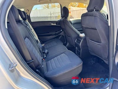 Piąte zdjęcie samochodu w środku: 2017 FORD EDGE SE VIN:2FMPK4G90HBB08063 - miniatura