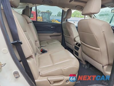 Zdjęcie 10 z 12 samochodu: 2018 HONDA PILOT TOURING VIN:5FNYF5H93JB007707 - miniatura
