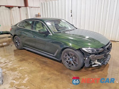 Czwarte zdjęcie samochodu z boku: 2024 BMW I4 EDRIVE 35 VIN:WBY43AW04RFT19111 - miniatura