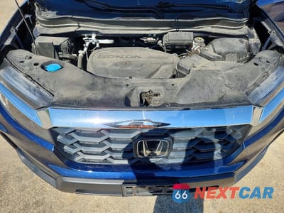 Zdjęcie 11 z 12 samochodu: 2022 HONDA PASSPORT EXL VIN:5FNYF8H5XNB023066 - miniatura