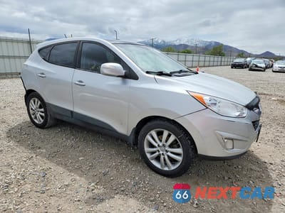 Czwarte zdjęcie samochodu z boku: 2013 HYUNDAI TUCSON LIMITED VIN:KM8JUCAC4DU563730 - miniatura