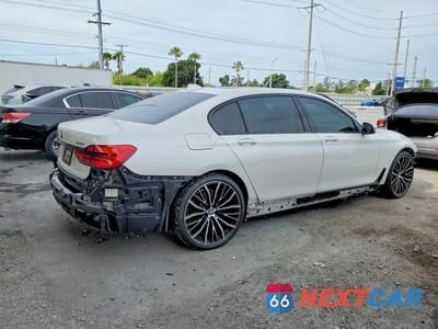 Trzecie zdjęcie samochodu z tyłu: 2019 BMW 750 I VIN:WBA7F0C55KGM24902 - miniatura