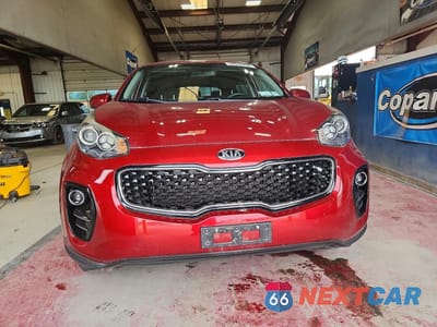 Piąte zdjęcie samochodu w środku: 2019 KIA SPORTAGE LX VIN:KNDPMCAC8K7605438 - miniatura