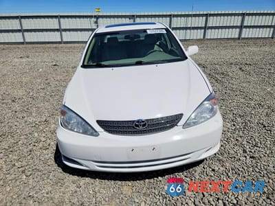 Piąte zdjęcie samochodu w środku: 2002 TOYOTA CAMRY XLE V6 VIN:JTDBF30K420002122 - miniatura