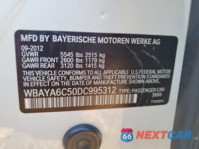 Zdjęcie 12 z 12 samochodu: 2013 BMW 740 I VIN:WBAYA6C50DC995312 - miniatura