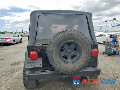Zdjęcie 6 z 12 samochodu: 2002 JEEP WRANGLER / TJ SPORT VIN:1J4FA49S62P719289 - miniatura