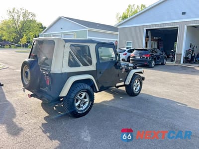 Czwarte zdjęcie samochodu z boku: 2001 JEEP WRANGLER / TJ SE VIN:1J4FA29P01P324149 - miniatura