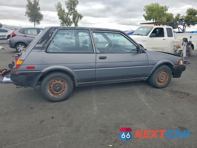Trzecie zdjęcie samochodu z tyłu: 1988 TOYOTA COROLLA DELUXE VIN:1NXAE82G4JZ527804 - miniatura