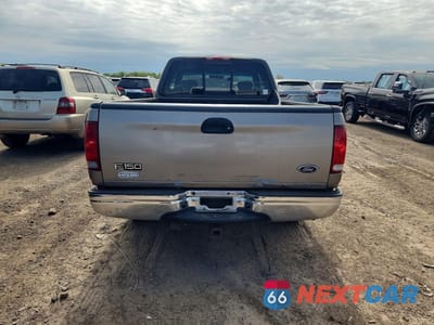 Zdjęcie 6 z 13 samochodu: 2001 FORD F150 VIN:1FTRX17W31NA59552 - miniatura