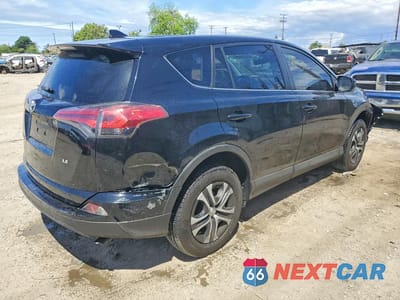 Trzecie zdjęcie samochodu z tyłu: 2018 TOYOTA RAV4 LE VIN:2T3ZFREV4JW449855 - miniatura