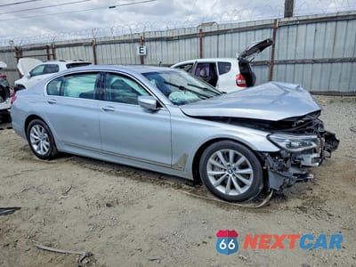 Czwarte zdjęcie samochodu z boku: 2018 BMW 750 I VIN:WBA7F0C50JGM23722 - miniatura