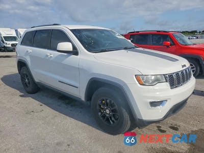 Czwarte zdjęcie samochodu z boku: 2019 JEEP GRAND CHEROKEE LAREDO VIN:1C4RJEAG6KC649932 - miniatura