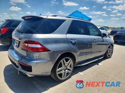 Trzecie zdjęcie samochodu z tyłu: 2014 MERCEDES-BENZ ML 63 AMG VIN:4JGDA7EB0EA283479 - miniatura
