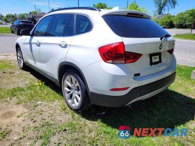 Trzecie zdjęcie samochodu z tyłu: 2013 BMW X1 XDRIVE28I VIN:WBAVL1C53DVR86785 - miniatura