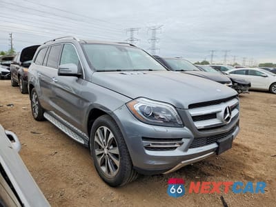 Czwarte zdjęcie samochodu z boku: 2015 MERCEDES-BENZ GL 450 4MATIC VIN:4JGDF6EE6FA486030 - miniatura