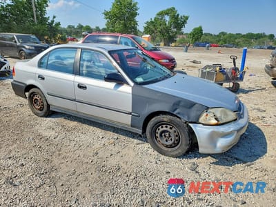 Czwarte zdjęcie samochodu z boku: 1998 HONDA CIVIC LX VIN:1HGEJ6670WL042509 - miniatura