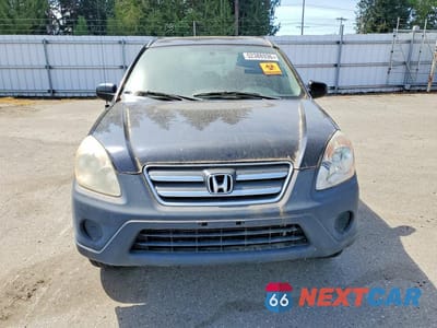 Piąte zdjęcie samochodu w środku: 2006 HONDA CR-V LX VIN:JHLRD685X6C006624 - miniatura
