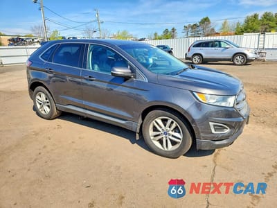 Czwarte zdjęcie samochodu z boku: 2018 FORD EDGE SEL VIN:2FMPK3J9XJBC32642 - miniatura