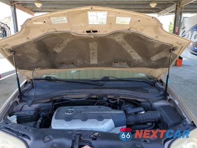 Zdjęcie 12 z 13 samochodu: 2004 ACURA MDX TOURING VIN:2HNYD18624H549233 - miniatura