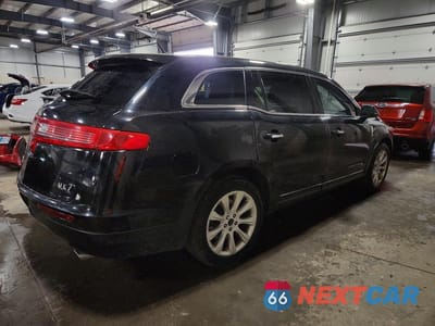Trzecie zdjęcie samochodu z tyłu: 2019 LINCOLN MKT VIN:2LMHJ5AT0KBL01648 - miniatura