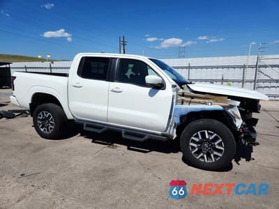 Czwarte zdjęcie samochodu z boku: 2022 NISSAN FRONTIER SV VIN:1N6ED1EK2NN683031 - miniatura