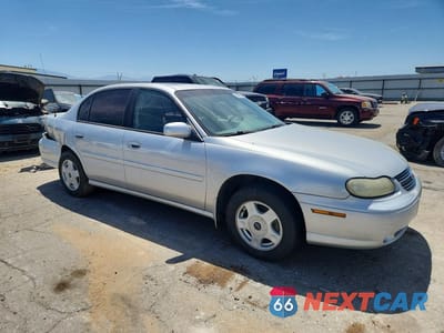 Czwarte zdjęcie samochodu z boku: 2001 CHEVROLET MALIBU LS VIN:1G1NE52J716247467 - miniatura