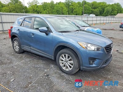 Czwarte zdjęcie samochodu z boku: 2016 MAZDA CX-5 TOURING VIN:JM3KE4CY8G0895807 - miniatura