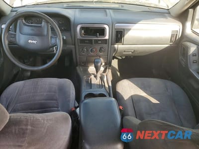 Zdjęcie 8 z 13 samochodu: 2002 JEEP GRAND CHEROKEE LAREDO VIN:1J4GX48S32C146122 - miniatura