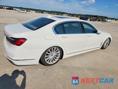 Trzecie zdjęcie samochodu z tyłu: 2020 BMW 740 I VIN:WBA7T2C07LCE43469 - miniatura