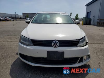 Piąte zdjęcie samochodu w środku: 2011 VOLKSWAGEN JETTA TDI VIN:3VW3L7AJ9BM124253 - miniatura