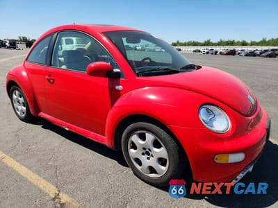 Czwarte zdjęcie samochodu z boku: 2002 VOLKSWAGEN NEW BEETLE GLS VIN:3VWCK21C72M449376 - miniatura