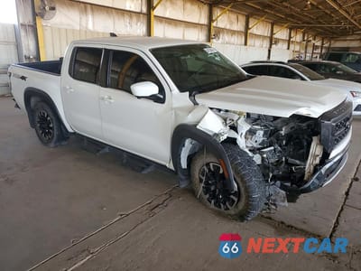 Czwarte zdjęcie samochodu z boku: 2023 NISSAN FRONTIER PRO-4X VIN:1N6ED1EK7PN631901 - miniatura