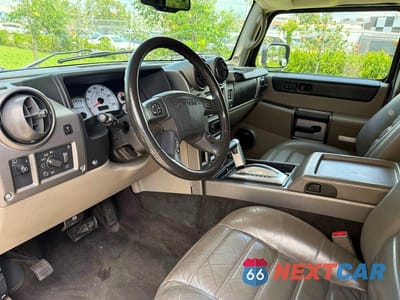 Zdjęcie 9 z 13 samochodu: 2003 HUMMER H2 VIN:5GRGN23U03H119486 - miniatura