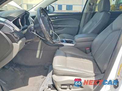 Zdjęcie 7 z 13 samochodu: 2012 CADILLAC SRX VIN:3GYFNGE37CS545112 - miniatura