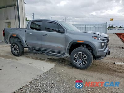 Czwarte zdjęcie samochodu z boku: 2024 GMC CANYON AT4X VIN:1GTP6EEK3R1138546 - miniatura