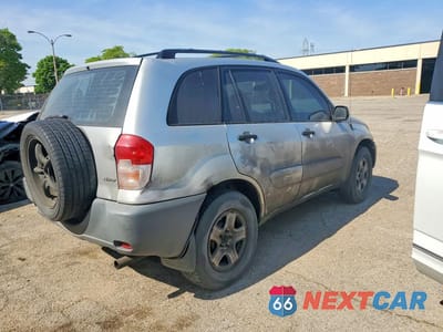 Trzecie zdjęcie samochodu z tyłu: 2001 TOYOTA RAV4 BASE VIN:JTEHH20V110050180 - miniatura
