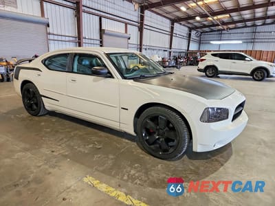 Czwarte zdjęcie samochodu z boku: 2006 DODGE CHARGER R VIN:2B3KA53H96H334795 - miniatura