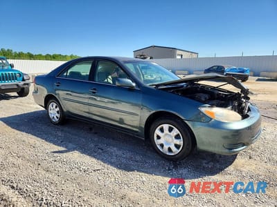 Czwarte zdjęcie samochodu z boku: 2002 TOYOTA CAMRY LE VIN:4T1BE32K52U608517 - miniatura