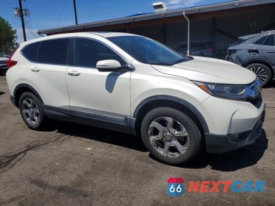 Czwarte zdjęcie samochodu z boku: 2017 HONDA CR-V EXL VIN:2HKRW2H84HH673058 - miniatura