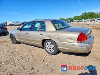 Drugie zdjęcie samochodu z przodu: 1999 FORD CROWN VICTORIA VIN:2FAFP73W5XX115810 - miniatura