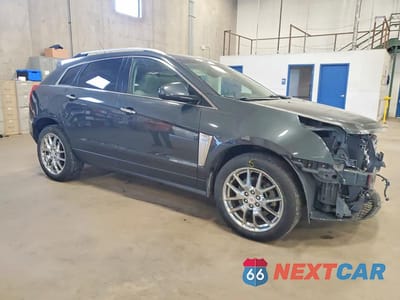 Czwarte zdjęcie samochodu z boku: 2014 CADILLAC SRX PREMIUM COLLECTION VIN:3GYFNGE35ES677191 - miniatura