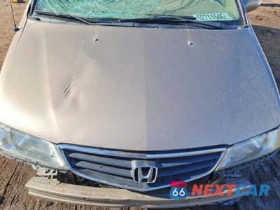 Zdjęcie 11 z 12 samochodu: 2003 HONDA ODYSSEY EXL VIN:2HKRL18923H504824 - miniatura