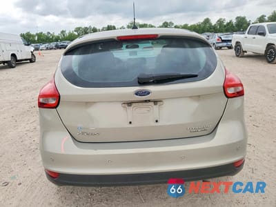 Zdjęcie 6 z 12 samochodu: 2015 FORD FOCUS TITANIUM VIN:1FADP3N21FL268836 - miniatura