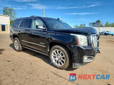 Czwarte zdjęcie samochodu z boku: 2015 GMC YUKON DENALI VIN:1GKS2CKJ9FR611406 - miniatura